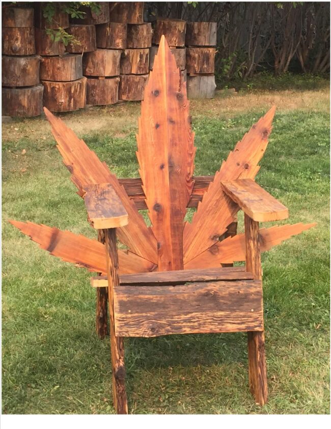 Chair outdoor shaped like cannabis leaf back support